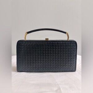 Ganson vintage woven handbag with gold handle accents